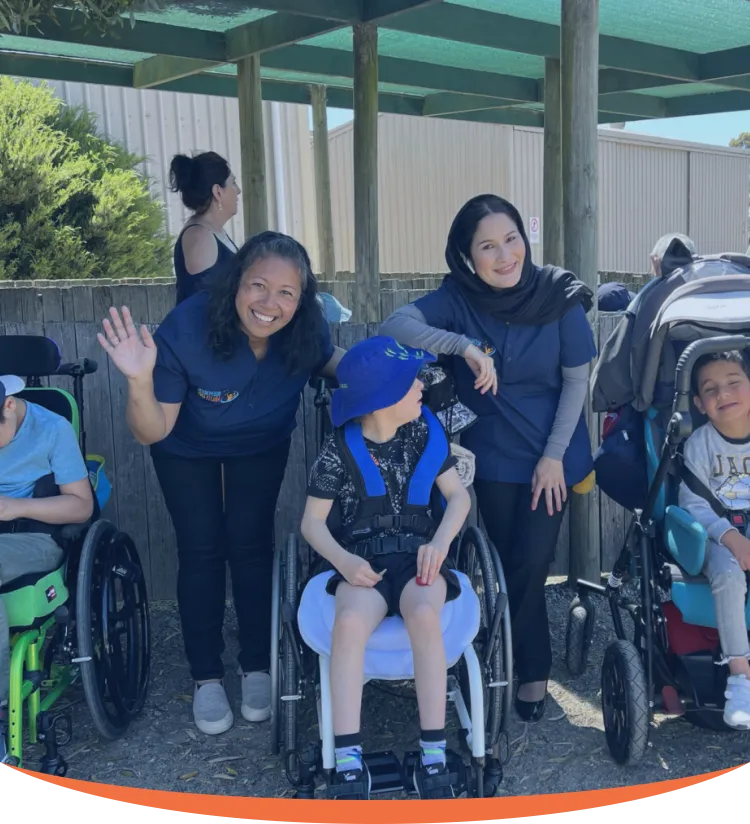 The Image Is Showing That Team Member Are Spending Time With Children With Special Needs.
